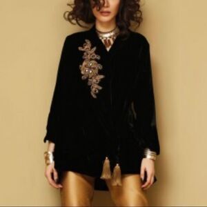 Black velvet top with gold pants